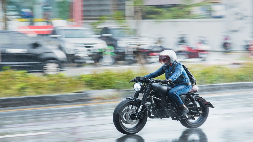 a motorcyclist speeding on city road